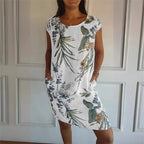 Sommarklänning med Botaniskt Print & Fickor – Boho Stil - STILUNA
